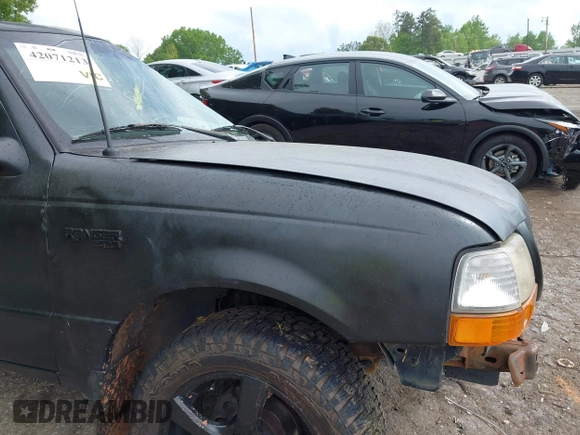 2000 Ford Ranger XL z VIN 1FTYR14C8YTA87370, wystawiony jako IAAI lot #42071213 z przebiegiem Nie podano mil oraz . Historia ofert i sprzedaży dostępna na DreamBid. Obrazek 15.