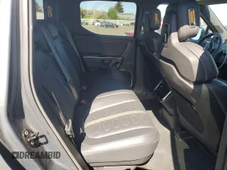 2022 Rivian R1T Adventure z VIN 7FCTGAAA5NN014843, wystawiony jako Copart lot #47668545 z przebiegiem 42 640 mil mil oraz Szkody całkowita. Historia ofert i sprzedaży dostępna na DreamBid. Obrazek 11.