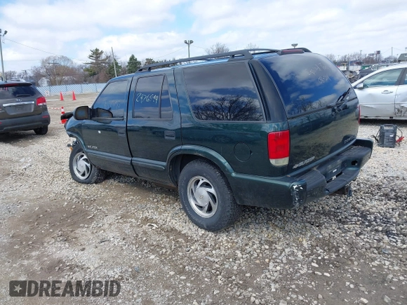 2003 Chevrolet Blazer LS z VIN 1GNDT13X93K177170, wystawiony jako IAAI lot #41839837 z przebiegiem 148 555 mil mil oraz . Historia ofert i sprzedaży dostępna na DreamBid. Obrazek 3.