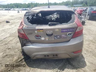 2014 Hyundai Accent SE with VIN KMHCU5AEXEU159810, listed as a Copart auction lot 61634604 with 0 mi miles and Salvage Title. Bid and sale history available at carsss.com. Image 6.