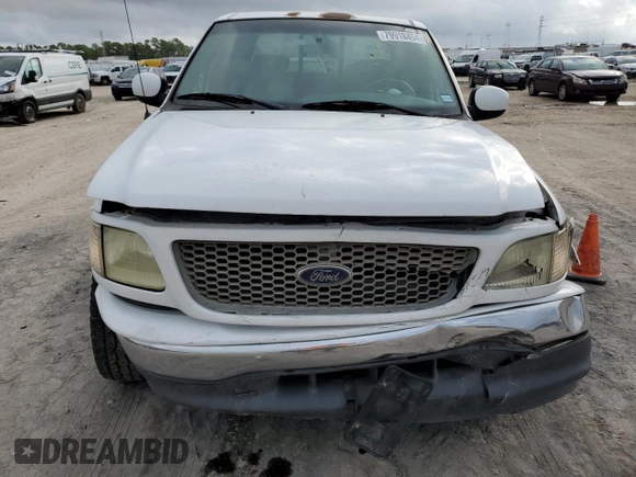 2001 Ford F-150 XLT with VIN 1FTRW07L01KC60815, listed as a Copart auction lot 87022424 with 205,304 mi miles and Salvage title. Bid and sale history available at DreamBid. Image 5.