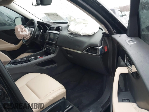 2018 Jaguar F-Pace 25t Premium with VIN SADCJ2FX0JA293960, listed as a IAAI auction lot 41099021 with 76,916 mi miles and . Bid and sale history available at DreamBid. Image 5.