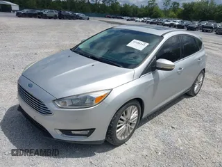 2018 Ford Focus Titanium with VIN 1FADP3N29JL232336, listed as a IAAI auction lot 42485243 with 82,113 mi miles and . Bid and sale history available at DreamBid. Image 2.