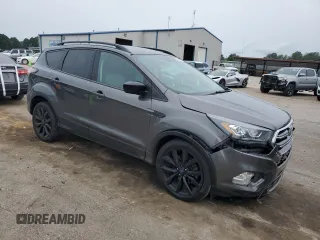 2017 Ford Escape SE z VIN 1FMCU9GD1HUB35003, wystawiony jako Copart lot #56502385 z przebiegiem 74 409 mil mil oraz Szkoda całkowita • Salvage title. Historia ofert i sprzedaży dostępna na DreamBid. Obrazek 4.