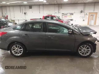 2016 Ford Focus SE with VIN 1FADP3F21GL247906, listed as a IAAI auction lot 42043546 with 124,532 mi miles and . Bid and sale history available at DreamBid. Image 13.