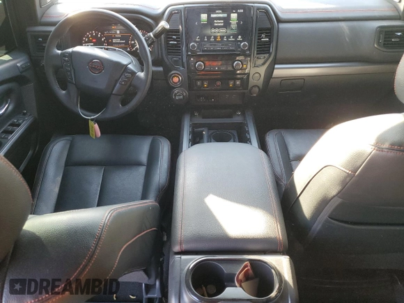 2024 Nissan Titan Pro-4X with VIN 1N6AA1ED5RN101017, listed as a Copart auction lot 43777785 with 30,489 mi miles and Salvage title. Bid and sale history available at DreamBid. Image 8.