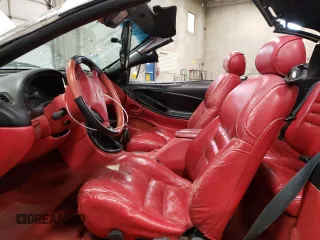 1994 Ford Mustang z VIN 1FALP45T4RF149529, wystawiony jako Copart lot #42222295 z przebiegiem 179 309 mil mil oraz Szkoda całkowita • Salvage title. Historia ofert i sprzedaży dostępna na DreamBid. Obrazek 7.