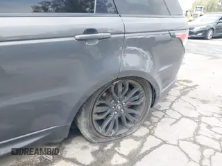 2017 Land Rover Range Rover Sport z VIN SALWR2FE3HA128925, wystawiony jako IAAI lot #42172945 z przebiegiem 82 022 mil mil oraz . Historia ofert i sprzedaży dostępna na DreamBid. Obrazek 18.