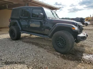 2019 Jeep Wrangler Unlimited Rubicon with VIN 1C4HJXFN2KW525606, listed as a Copart auction lot 62674225 with 55,128 mi miles and Salvage title. Bid and sale history available at DreamBid. Image 4.