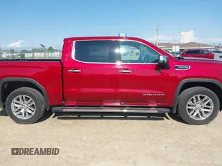2020 GMC Sierra 1500 SLT z VIN 1GTU9DED8LZ296394, wystawiony jako IAAI lot #42549855 z przebiegiem 105 510 mil mil oraz . Historia ofert i sprzedaży dostępna na DreamBid. Obrazek 13.
