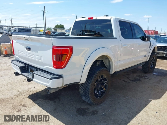 2021 Ford F-150 XL with VIN 1FTFW1E54MFC82133, listed as a IAAI auction lot 42170024 with 24,548 mi miles and . Bid and sale history available at DreamBid. Image 4.