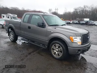 2014 Ford F-150 XL with VIN 1FTFX1EF8EFA97820, listed as a IAAI auction lot 41974347 with 148,018 mi miles. Bid and sale history available at carsss.com. Image 1.