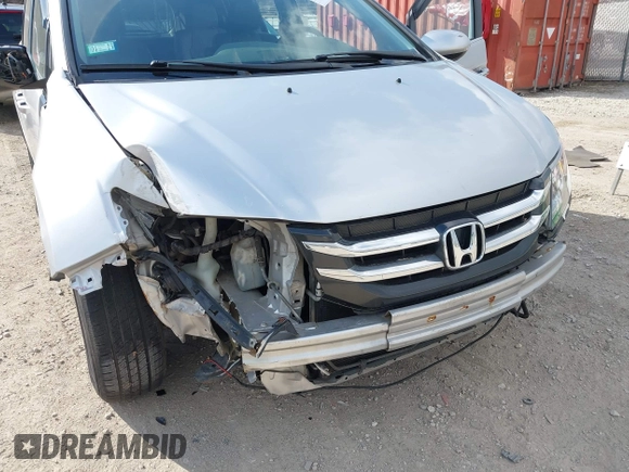 2015 Honda Odyssey EX-L with VIN 5FNRL5H61FB010289, listed as a IAAI auction lot 41887660 with 177,172 mi miles and . Bid and sale history available at carsss.com. Image 6.