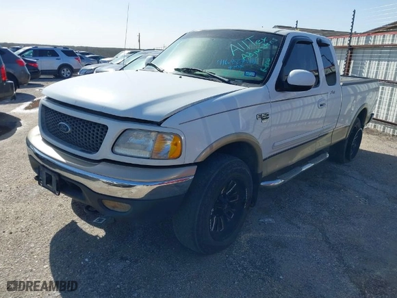 2000 Ford F-150 XL with VIN 1FTRX18W6YNA72319, listed as a IAAI auction lot 41682748 with 265,559 mi miles. Bid and sale history available at carsss.com. Image 2.