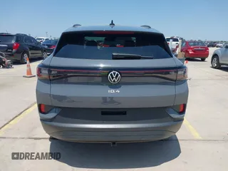 2023 Volkswagen ID.4 Pro S z VIN 1V2GNPE80PC006590, wystawiony jako IAAI lot #42178241 z przebiegiem 17 177 mil mil oraz . Historia ofert i sprzedaży dostępna na DreamBid. Obrazek 17.