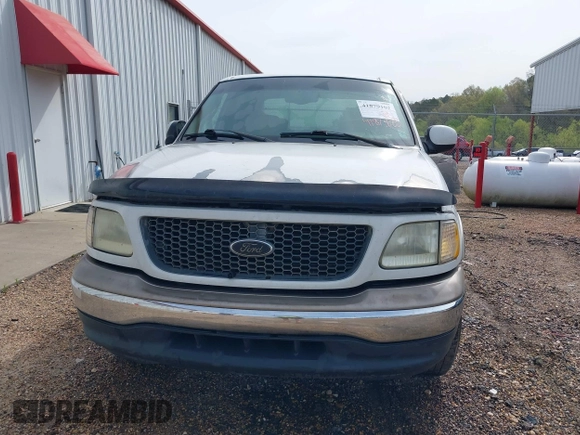 2001 Ford F-150 XLT with VIN 1FTRW07641KC51870, listed as a IAAI auction lot 41879102 with 202,967 mi miles and . Bid and sale history available at DreamBid. Image 6.