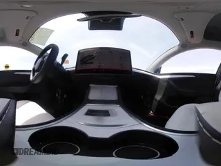 2023 Tesla Model Y Long Range z VIN 7SAYGDEE1PA158661, wystawiony jako IAAI lot #41983897 z przebiegiem 20 176 mil mil oraz . Historia ofert i sprzedaży dostępna na DreamBid. Obrazek 22.