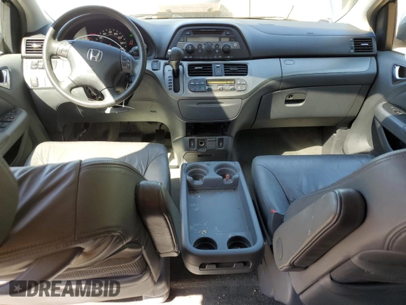 2005 Honda Odyssey EX-L z VIN 5FNRL386X5B034514, wystawiony jako Copart lot #52702435 z przebiegiem 65 988 mil mil oraz Szkoda całkowita • Salvage title. Historia ofert i sprzedaży dostępna na DreamBid. Obrazek 8.