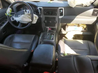 2009 Jeep Grand Cherokee Laredo with VIN 1J8GR48K19C533447, listed as a Copart auction lot 48700275 with 115,991 mi miles and Salvage Title. Bid and sale history available at carsss.com. Image 8.