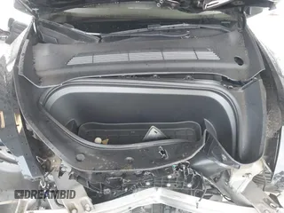 2023 Tesla Model Y Long Range with VIN 7SAYGDEE0PF909610, listed as a IAAI auction lot 41906081 with 20,656 mi miles and . Bid and sale history available at DreamBid. Image 10.