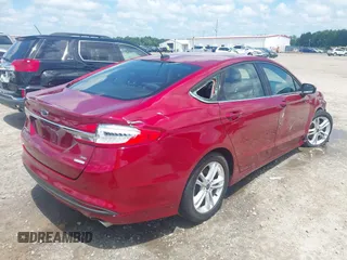 2018 Ford Fusion SE with VIN 3FA6P0HD7JR258701, listed as a IAAI auction lot 42637023 with 150,471 mi miles and . Bid and sale history available at DreamBid. Image 4.