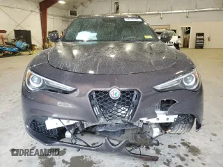 2019 Alfa Romeo Stelvio Ti z VIN ZASPAKBN3K7C29998, wystawiony jako Copart lot #54129185 z przebiegiem Nie podano mil oraz Szkoda całkowita • Salvage title. Historia ofert i sprzedaży dostępna na DreamBid. Obrazek 5.