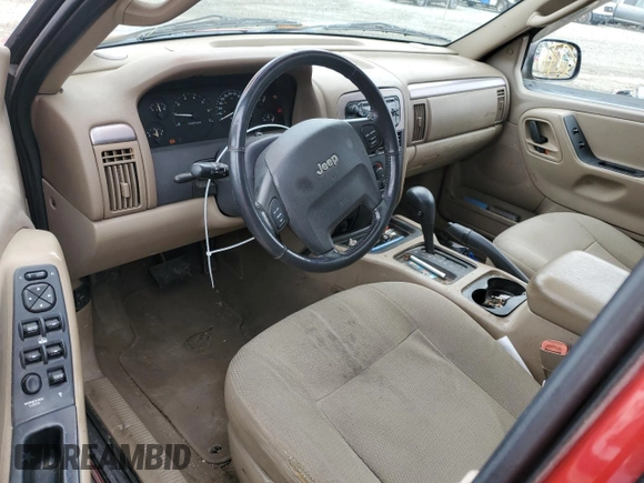 2002 Jeep Grand Cherokee with VIN 1J8GX38S92C176329, listed as a Copart auction lot 47885635 with 154,167 mi miles and Salvage title. Bid and sale history available at DreamBid. Image 8.
