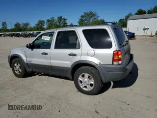 2002 Ford Escape XLT Choice with VIN 1FMCU04162KB00207, listed as a Copart auction lot 56414275 with 143,085 mi miles and Salvage title. Bid and sale history available at DreamBid. Image 2.