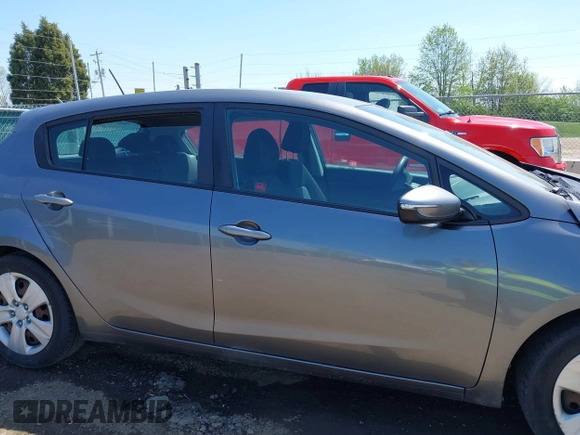 2016 Kia Forte 5-Door LX with VIN KNAFK5A81G5654585, listed as a IAAI auction lot 42103861 with 201,547 mi miles. Bid and sale history available at carsss.com. Image 14.