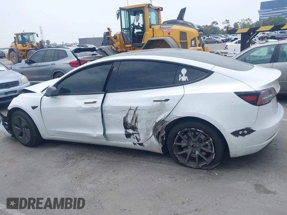 2023 Tesla Model 3 with VIN 5YJ3E1EA2PF417959, listed as a IAAI auction lot 42463853 with 22,736 mi miles and . Bid and sale history available at DreamBid. Image 15.