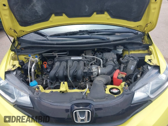 2015 Honda Fit LX z VIN 3HGGK5H58FM768970, wystawiony jako IAAI lot #42760686 z przebiegiem 89 531 mil mil oraz . Historia ofert i sprzedaży dostępna na DreamBid. Obrazek 10.