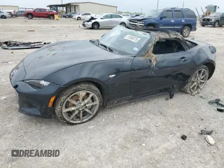 2023 Mazda MX-5 Miata Grand Touring z VIN JM1NDAD76P0556346, wystawiony jako Copart lot #51569275 z przebiegiem 20 565 mil mil oraz Szkoda całkowita • Salvage title. Historia ofert i sprzedaży dostępna na DreamBid. Obrazek 1.