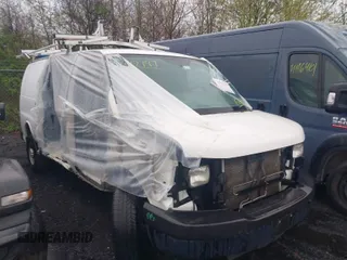 2015 Chevrolet Express Cargo Van with VIN 1GCWGFCF6F1152795, listed as a IAAI auction lot 41912147 with 101,265 mi miles. Bid and sale history available at carsss.com. Image 1.