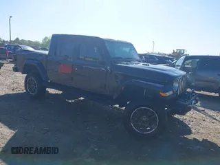 2023 Jeep Gladiator Overland with VIN 1C6HJTFG9PL549685, listed as a IAAI auction lot 42037635 with 40,734 mi miles and . Bid and sale history available at DreamBid. Image 1.