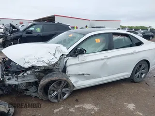 2021 Volkswagen Jetta S z VIN 3VWC57BUXMM017430, wystawiony jako IAAI lot #41947038 z przebiegiem 50 277 mil mil oraz . Historia ofert i sprzedaży dostępna na DreamBid. Obrazek 6.