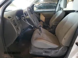 2006 Ford Escape XLT with VIN 1FMYU03166KA73605, listed as a Copart auction lot 71968524 with 143,742 mi miles and Salvage Title. Bid and sale history available at carsss.com. Image 7.