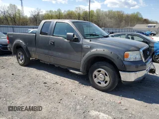 2007 Ford F-150 XLT with VIN 1FTPX14597NA52942, listed as a Copart auction lot 52980215 with 149,889 mi miles and Salvage Title. Bid and sale history available at carsss.com. Image 4.
