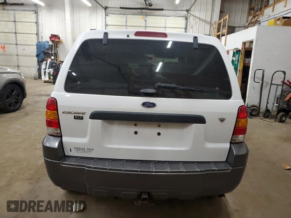 2006 Ford Escape XLT with VIN 1FMCU03106KC14923, listed as a Copart auction lot 52727095 with 126,842 mi miles and Salvage Title. Bid and sale history available at DreamBid. Image 6.