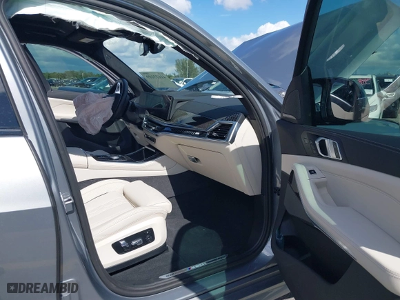 2025 BMW X5 M60i with VIN 5UX33EU03S9X62019, listed as a IAAI auction lot 41623189 with 5,749 mi miles. Bid and sale history available at carsss.com. Image 5.