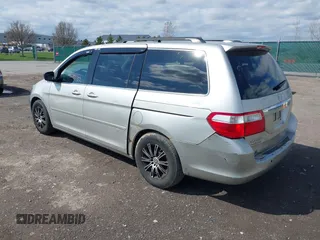 2007 Honda Odyssey Touring with VIN 5FNRL38827B045088, listed as a IAAI auction lot 42088752 with 224,655 mi miles. Bid and sale history available at carsss.com. Image 3.