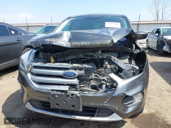 2017 Ford Escape SE z VIN 1FMCU0GD9HUD28110, wystawiony jako IAAI lot #41903505 z przebiegiem 66 808 mil mil oraz . Historia ofert i sprzedaży dostępna na DreamBid. Obrazek 13.