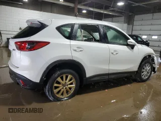 2015 Mazda CX-5 Sport with VIN JM3KE4BY4F0551679, listed as a Copart auction lot 68471374 with 198,987 mi miles and Non Repairable. Bid and sale history available at carsss.com. Image 3.