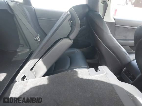 2020 Tesla Model 3 Standard Range Plus with VIN 5YJ3E1EA9LF708808, listed as a IAAI auction lot 40018323 with 32,069 mi miles. Bid and sale history available at carsss.com. Image 8.