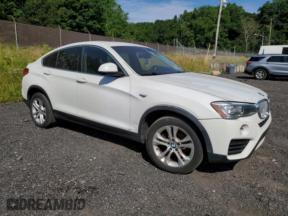 2015 BMW X4 xDrive28i with VIN 5UXXW3C51F0M89005, listed as a Copart auction lot 57392984 with 142,385 mi miles. Bid and sale history available at carsss.com. Image 4.