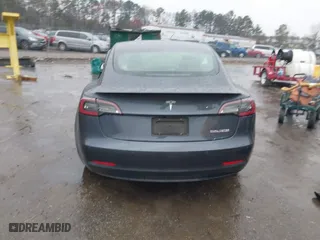 2022 Tesla Model 3 Performance with VIN 5YJ3E1EC2NF336135, listed as a IAAI auction lot 41853826 with 1 mi miles. Bid and sale history available at carsss.com. Image 16.