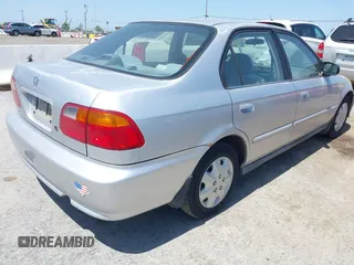 2000 Honda Civic VP with VIN 2HGEJ6610YH505518, listed as a IAAI auction lot 42181742 with 174,836 mi miles. Bid and sale history available at carsss.com. Image 4.
