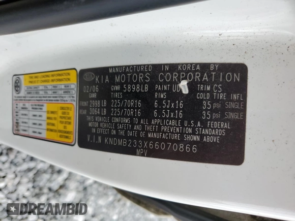 2006 Kia Sedona LX with VIN KNDMB233X66070866, listed as a Copart auction lot 71335794 with 242,416 mi miles and Salvage Title. Bid and sale history available at carsss.com. Image 14.
