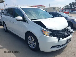 2016 Honda Odyssey SE with VIN 5FNRL5H33GB043303, listed as a IAAI auction lot 42215233 with 67,097 mi miles and . Bid and sale history available at DreamBid. Image 1.