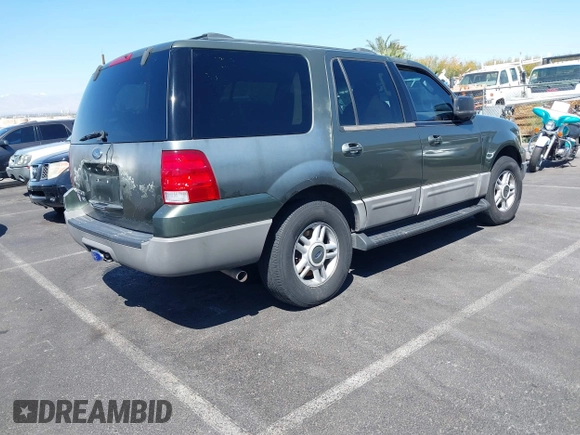 2003 Ford Expedition Special Service with VIN 1FMPU16L53LB21633, listed as a IAAI auction lot 41960271 with 196,178 mi miles. Bid and sale history available at carsss.com. Image 4.