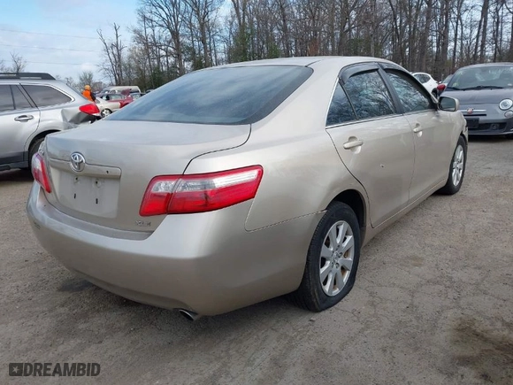 2007 Toyota Camry CE with VIN 4T1BE46K27U628277, listed as a IAAI auction lot 41911750 with 241,374 mi miles. Bid and sale history available at carsss.com. Image 4.